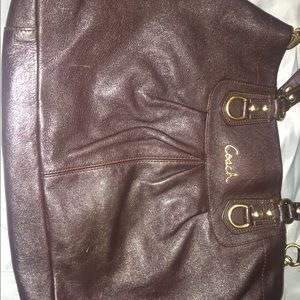 Coach hundred percent Leather dark brown bag.